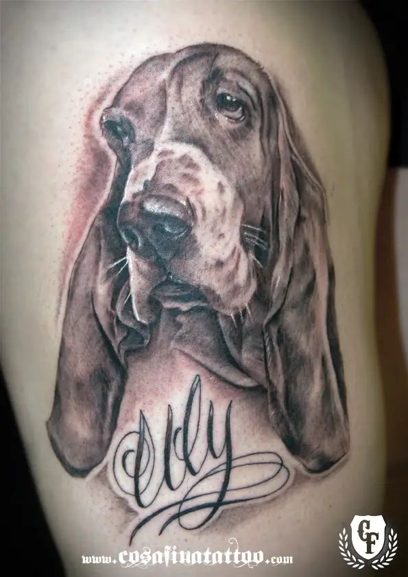 3D sad face of a Basset Hound Tattoo on the thigh