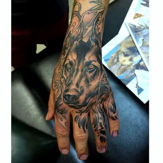 furious face of a German Shepherd Dog Tattoo in hand