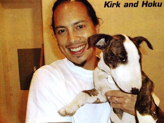 Kirk Hammett from Metallica carrying his English Bull Terrier