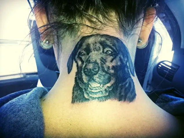 black Labrador tattoo on the neck