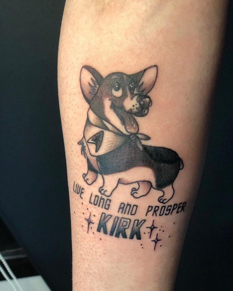 animated standing while smiling corgi and with quote- live long and prosper Kirk tattoo on the forearm