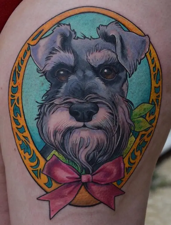 facé of Schnauzer inside a vintage frame with pink ribbon tattoo