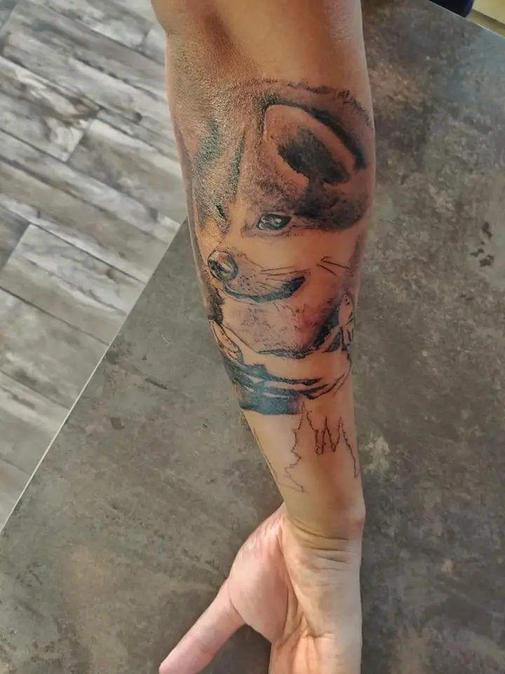 3D face of Akita Inu Tattoo on the back of the forearm