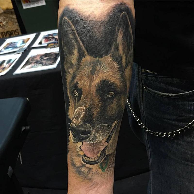 3D smiling German Shepherd Dog Tattoo on the forearm