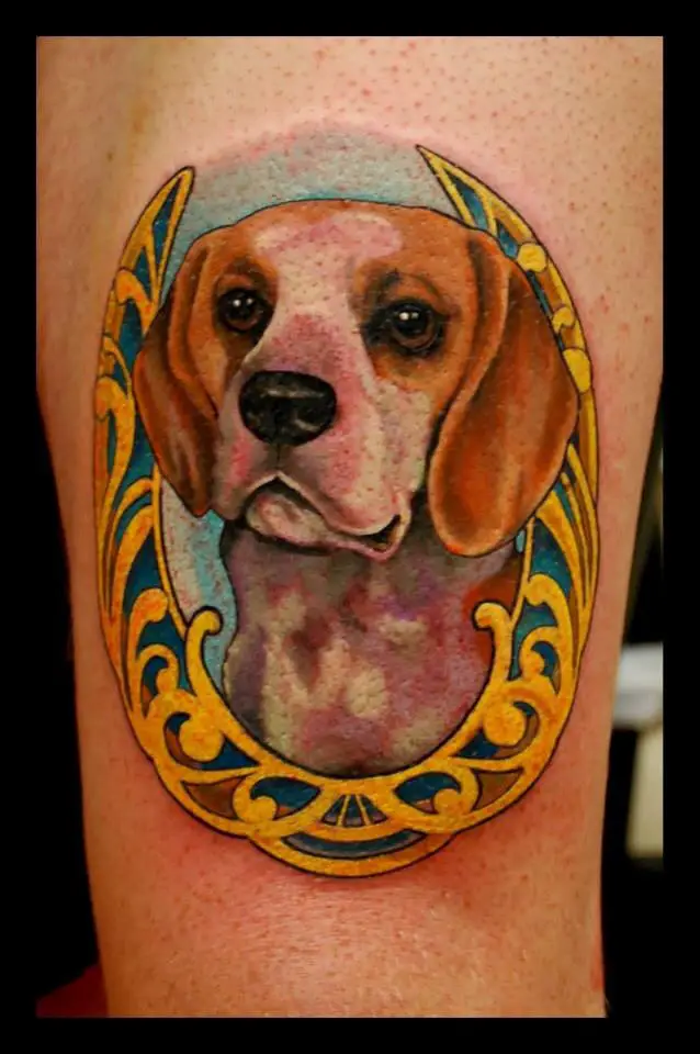3D Beagle inside a gold frame tattoo