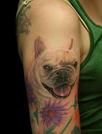 smiling French Bulldog with flowers Tattoo on the arm