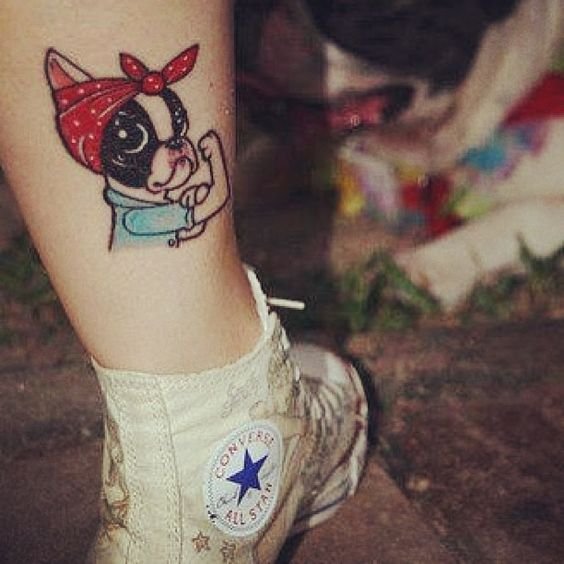 animated Boston Terrier wearing red scarf around its head while showing off her biceps