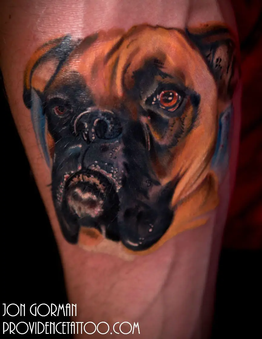 realistic face of Boxer Tattoo on the forearm