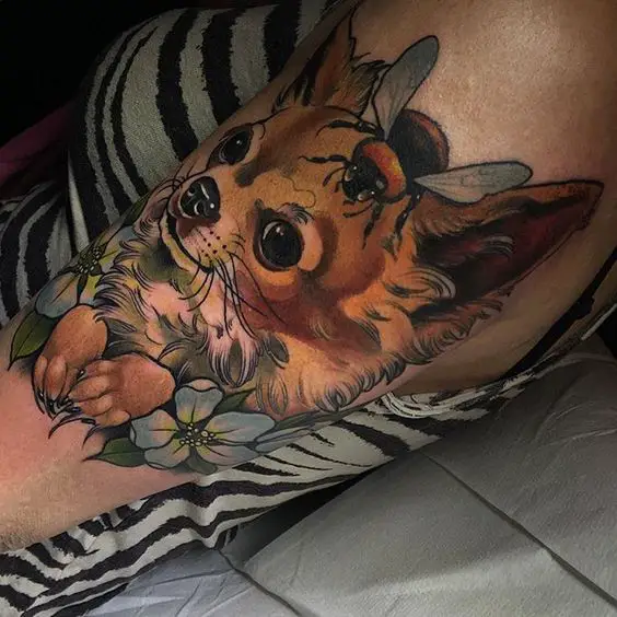 Chihuahua with bee and flowers tattoo on the leg