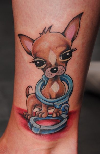 animated Chihuahua in handcuffs tattoo on the leg
