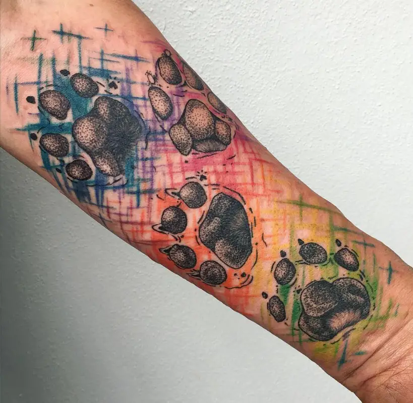 3D large paw print tattoos with colorful scratches tattoo on the forearm