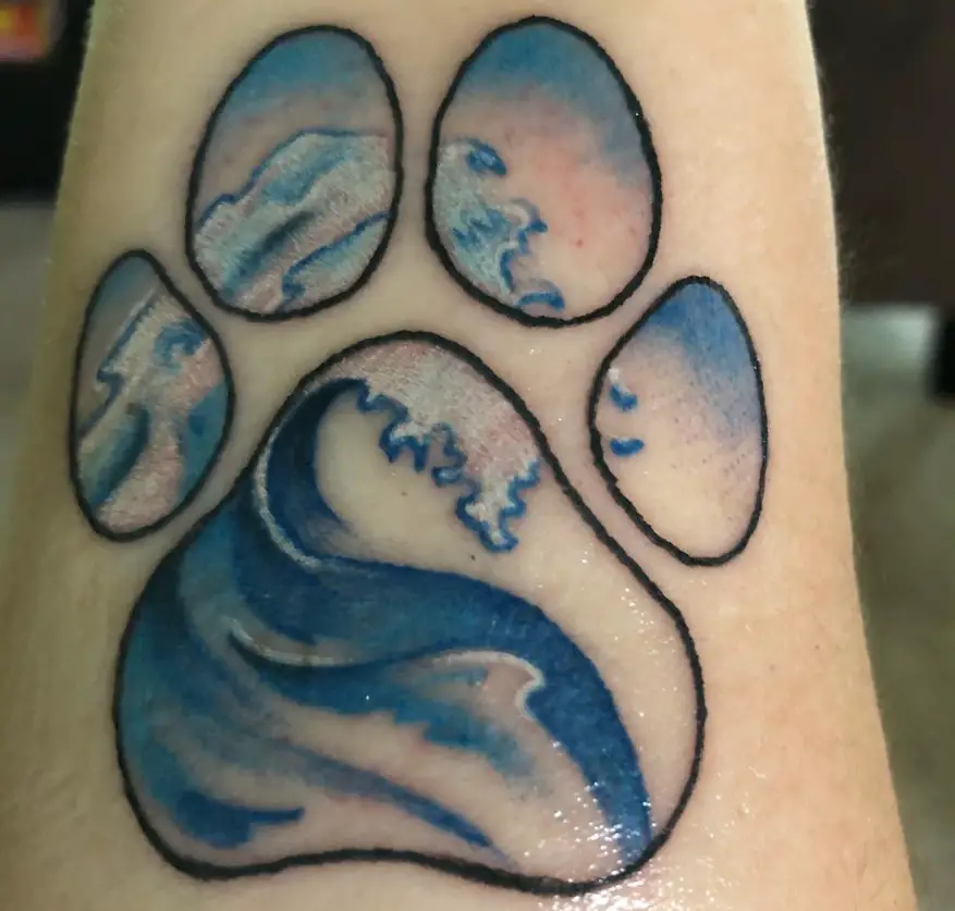 ocean paw print tattoo