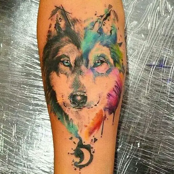 face of a Husky with black and gray on one side and the other one is designed with colorful watercolors tattoo