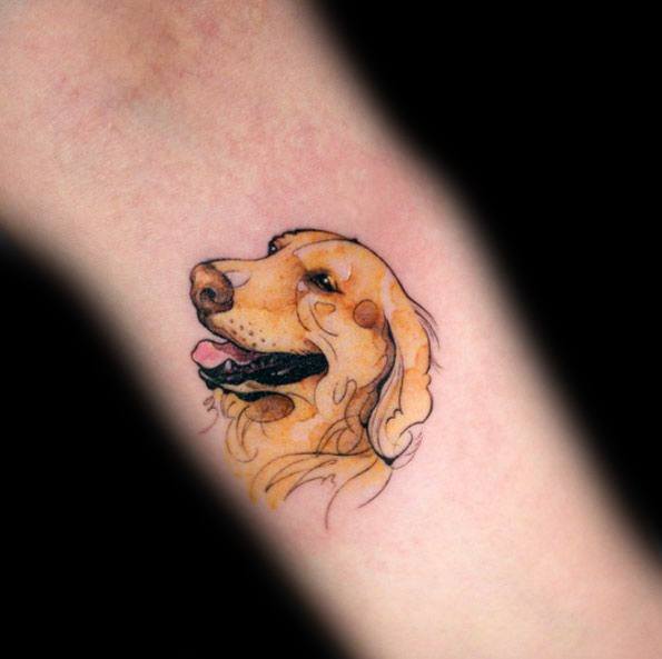 watercolor sideview smiling face of Golden Retriever Tattoo on the forearm