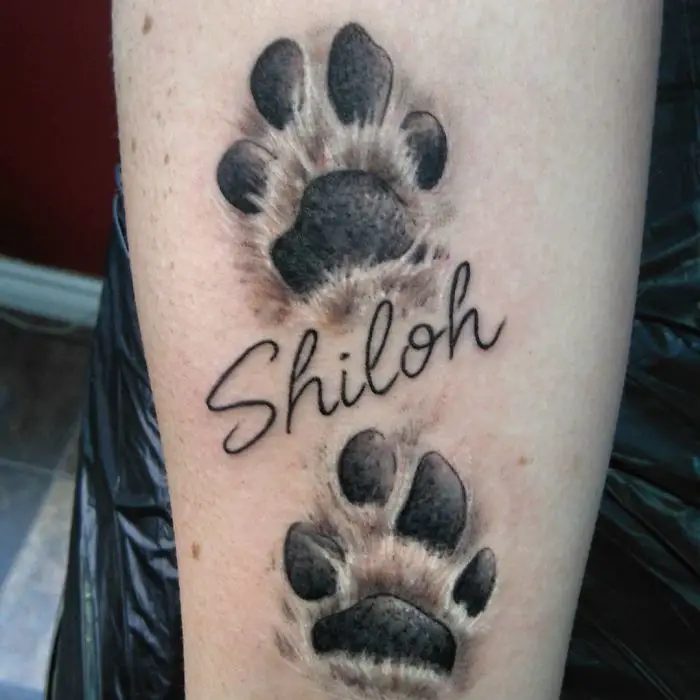 two paw print tattoo with 