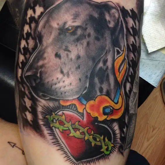 sideview face of a Great Dane tattoo on the leg