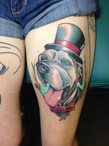 happy Great Dane wearing a hat tattoo on thigh