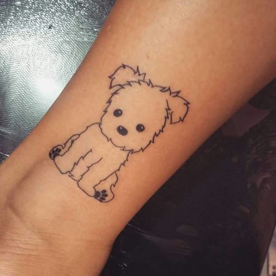 yorkie outline tattoo on the forearm