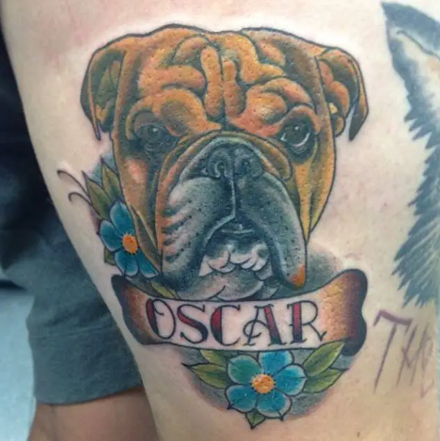 angry realistic face of English Bulldog with flowers and name tag tattoo