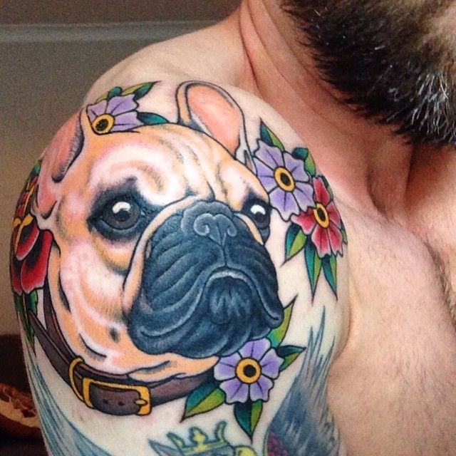 French Bulldog Tattoo with flowers tattoo on the shoulder