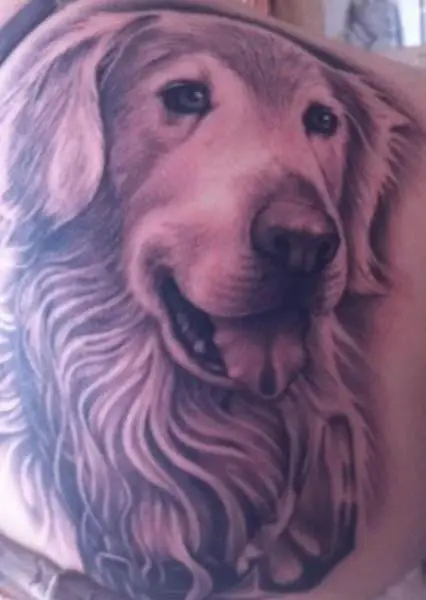 3D Golden Retriever with its tongue out tattoo on the back
