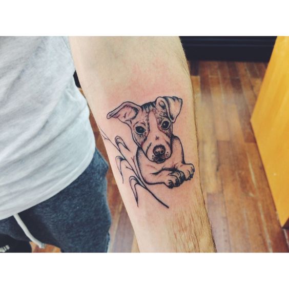 Jack Russell Terrier lying down Tattoo on the forearm