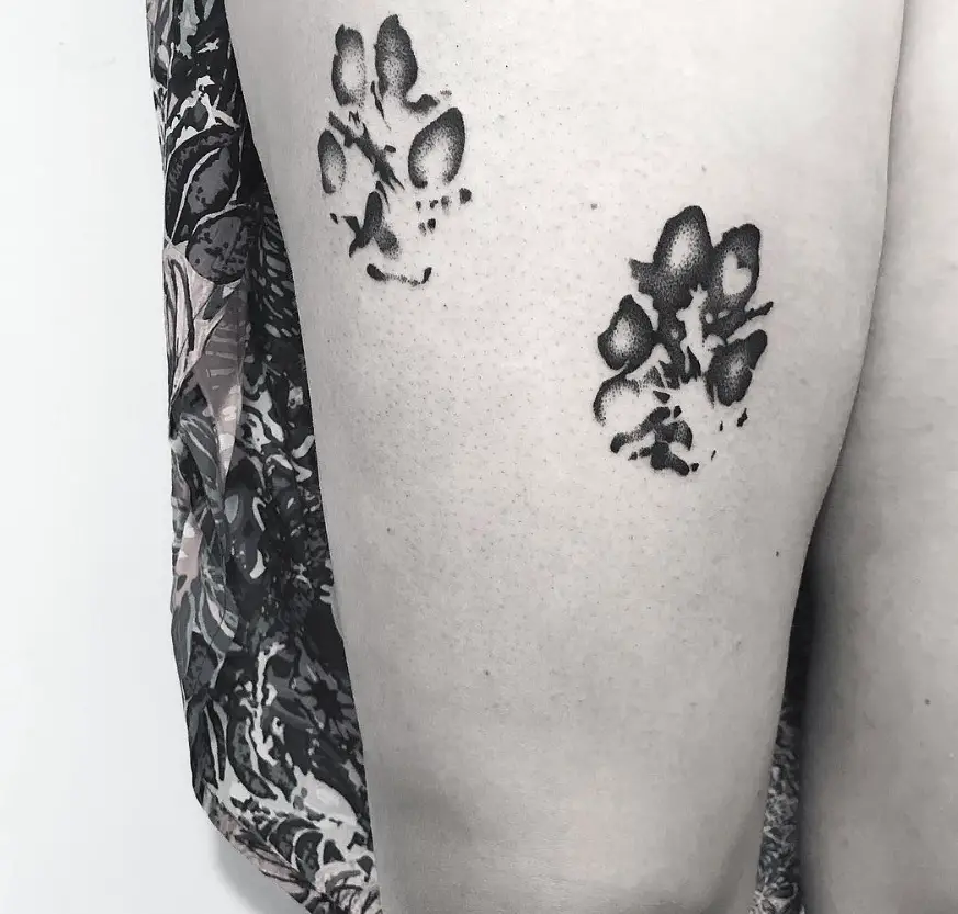 paw print tattoo on the back