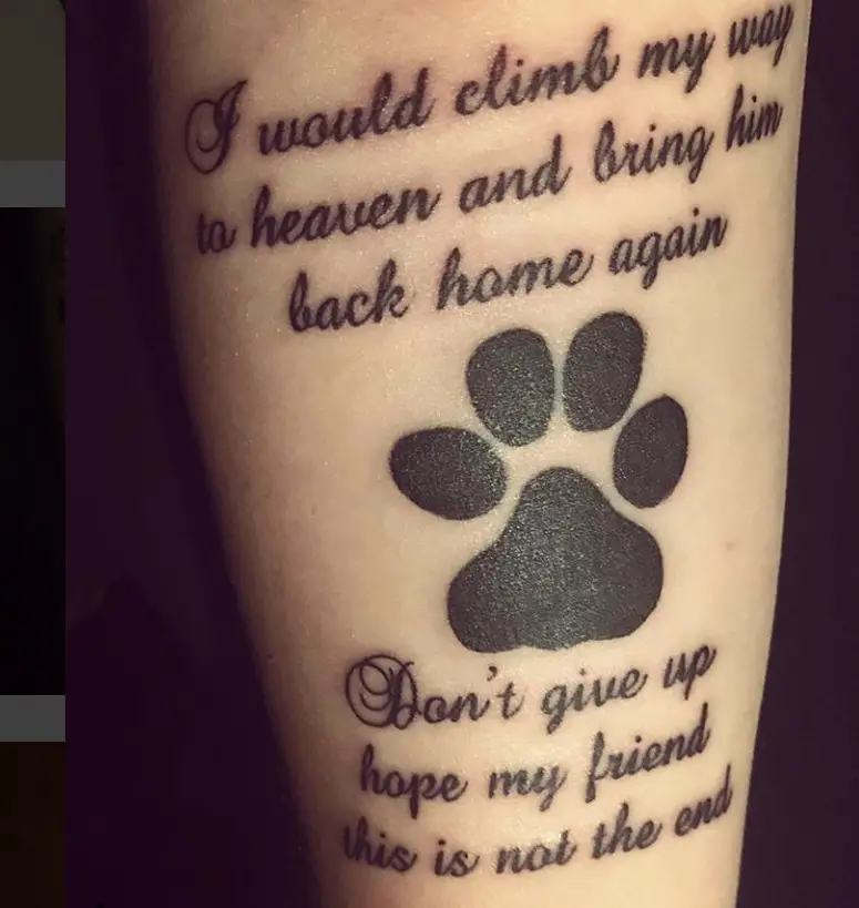 paw print with quote tattoo on the arm