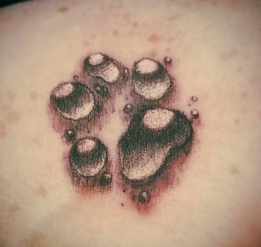 3D paw print tattoo