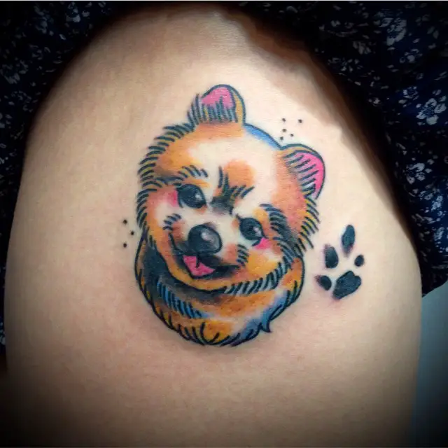 cite animated smiling Pomeranian with paw print tattoo