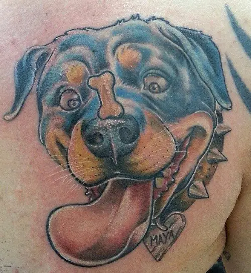 animated face of Rottweiler catching a bone treat tattoo