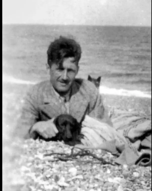 black and white photo of George Orwell with his Dachshund