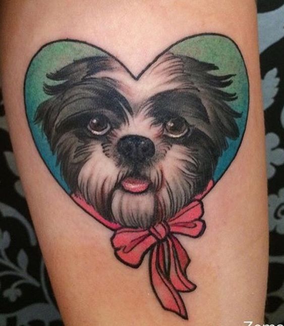 cute face of Shih Tzu inside a blue and green heart shape tattoo