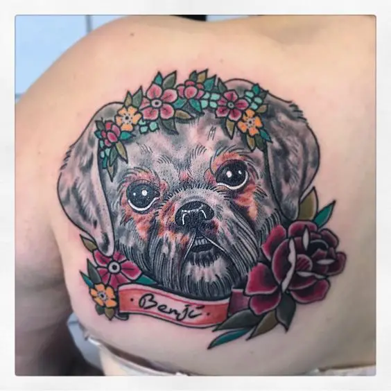 face of Shih Tzu with colorful flowers tattoo on the back