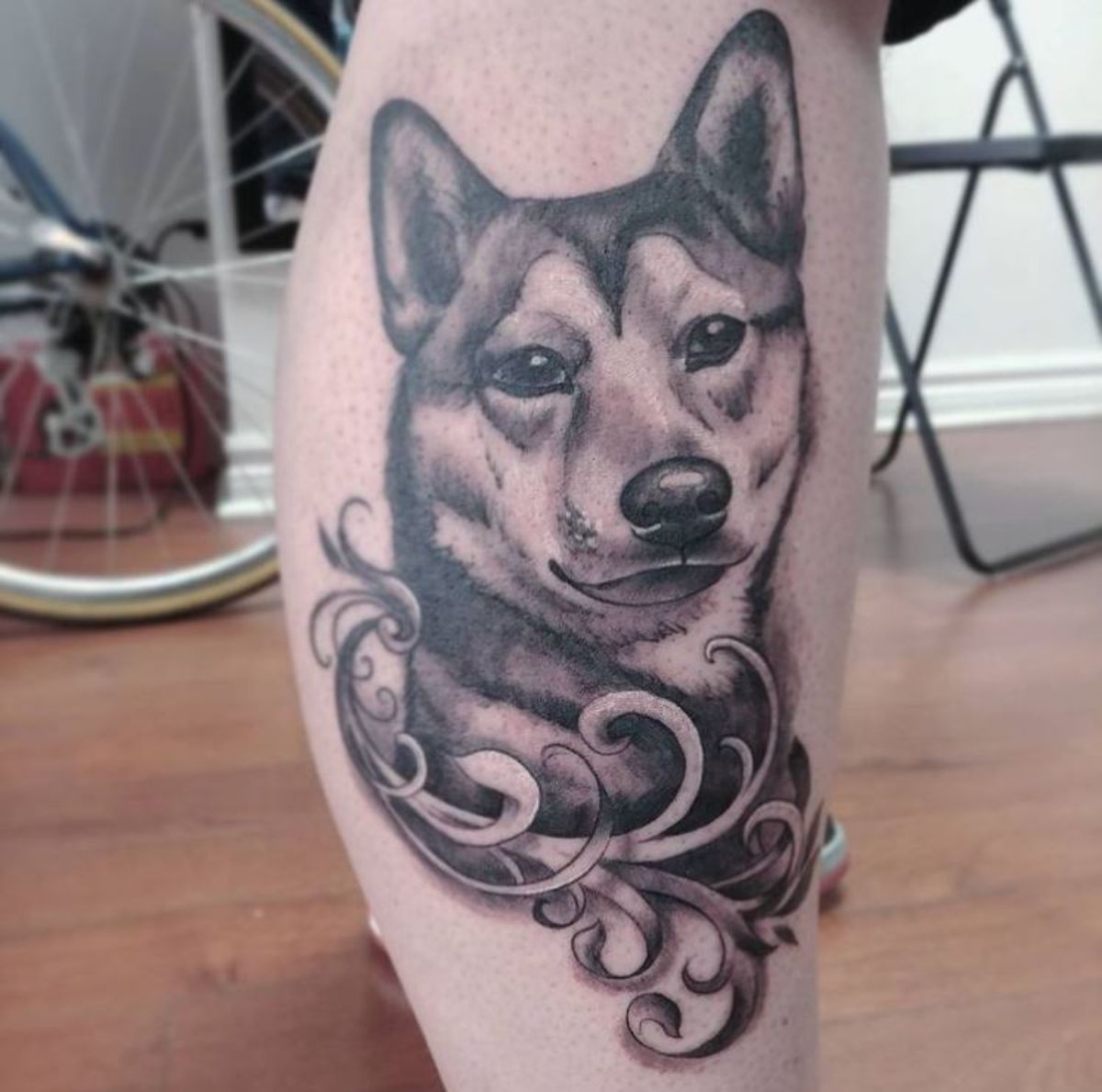 3D face of Shiba Inu tattoo on the leg
