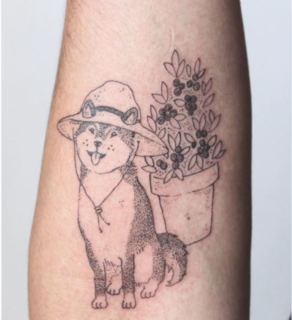 Shiba Inu farmer tattoo on the leg
