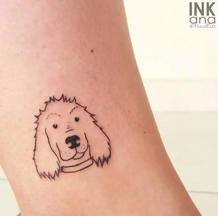 outline of animated face of Cocker Spaniel Tattoo