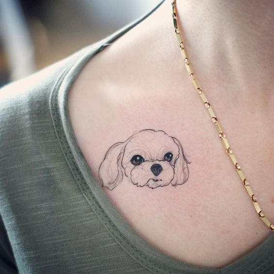 face of Cocker Spaniel puppy Tattoo on the chest