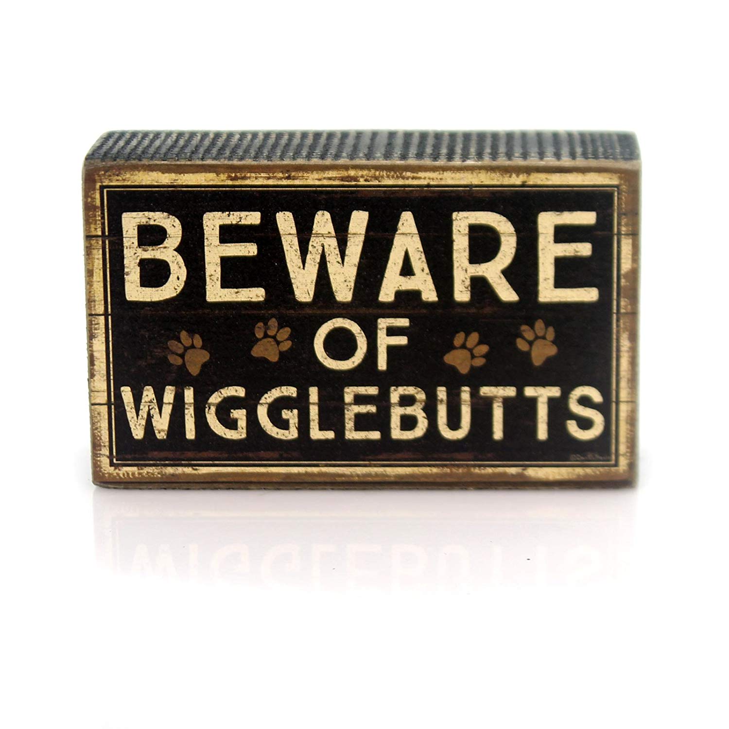 A sign board that says - Beware of Wigglebutts