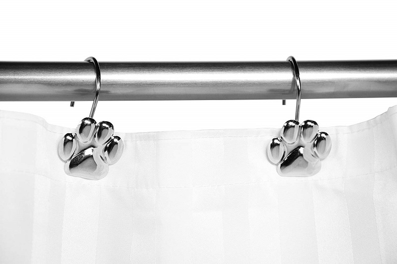 A paw print shower curtain hook 