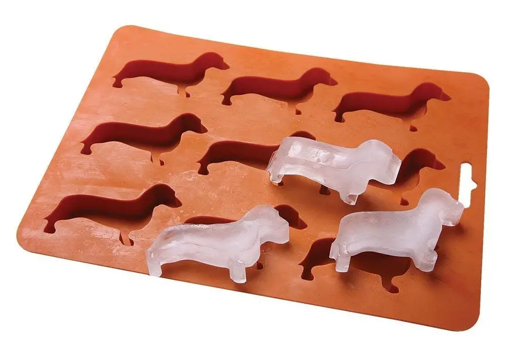 A silicone ice cube mold and tray with dachshund shaped hole