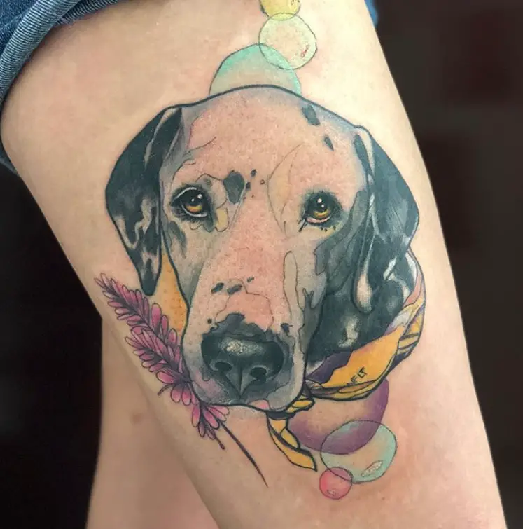 face of Dalmatian wearing a scarf in watercolor style with bubbles and flowers tattoo on thigh
