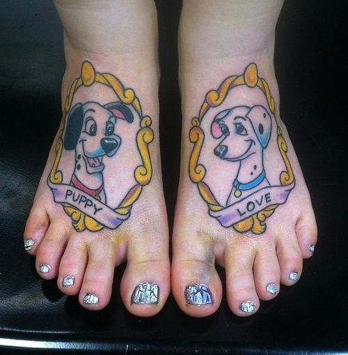 Dalmatian cartoon character- puppy and love on both feet looking at each other tattoo