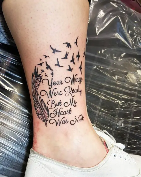 a feather and flying birds with quote 