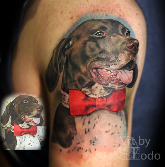 beown German Shorthaired Pointer wearing red ribbon around its neck tattoo on the back
