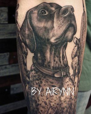 gray and black looking up German Shorthaired Pointer dog tattoo on the leg