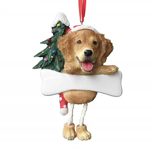 A Golden Retriever with dangling legs christmas tree ornament