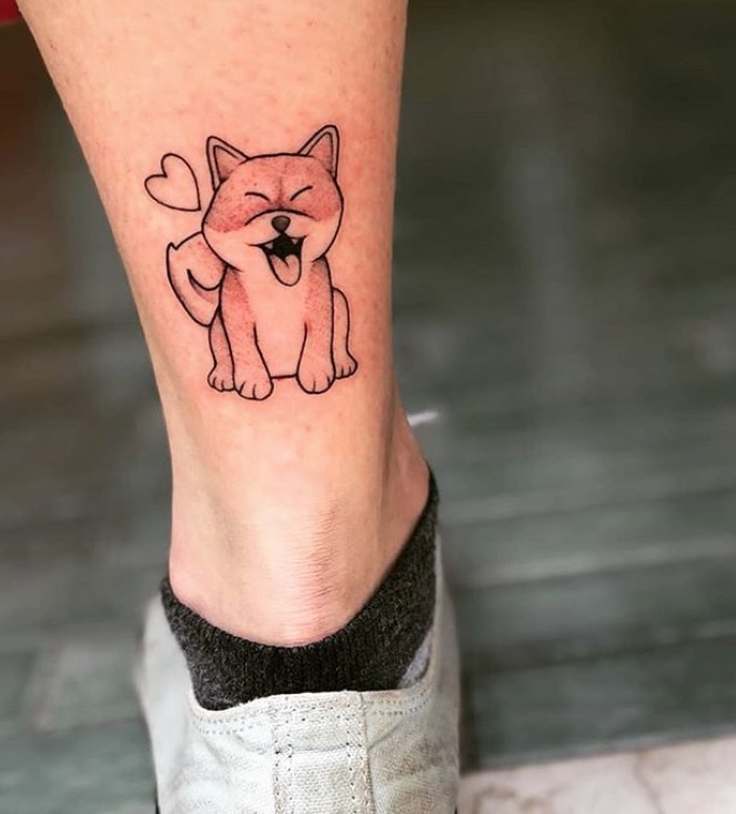 cute sitting Shiba Inu tattoo the back of the ankle