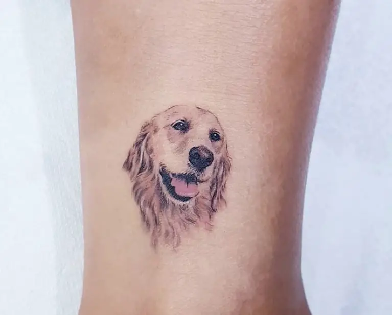 face of a golden retriever tattoo on the ankle