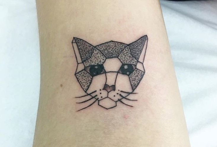 geometric face of a Black and White Cat tattoo